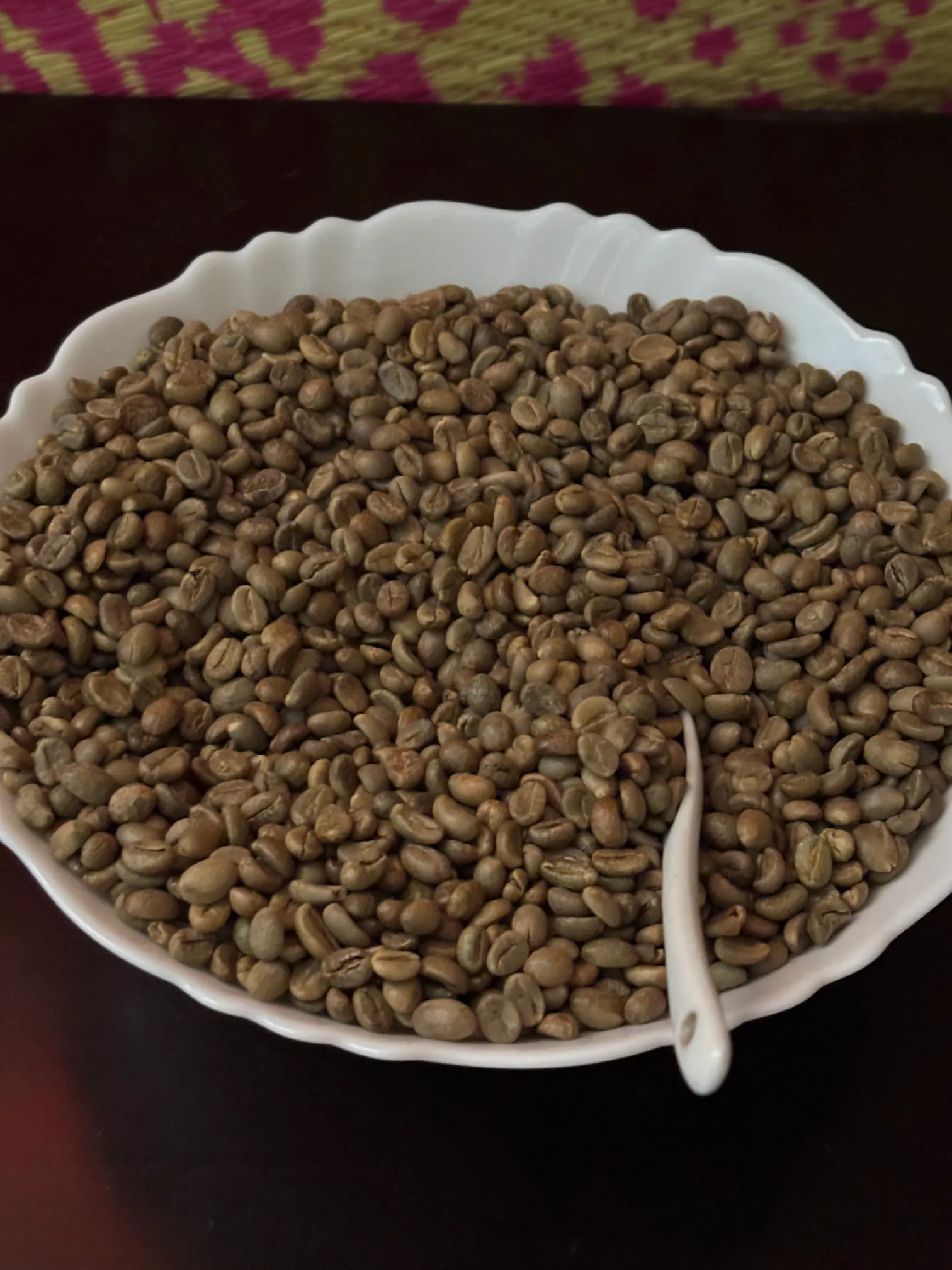 A bowl of raw green coffee beans from Coorg (Kodagu), Karnataka